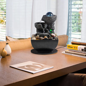 In a living room setup, AMOOTEK fountain creates a tranquil focal point.