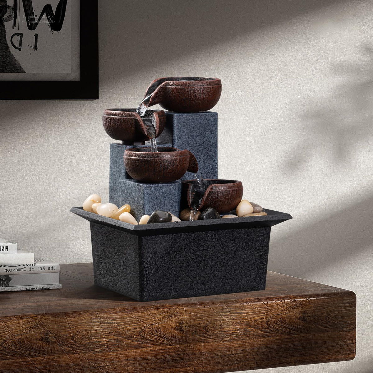 AMOOTEK fountain with natural river rocks included for an authentic look.
