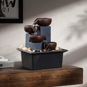 AMOOTEK fountain with natural river rocks included for an authentic look.