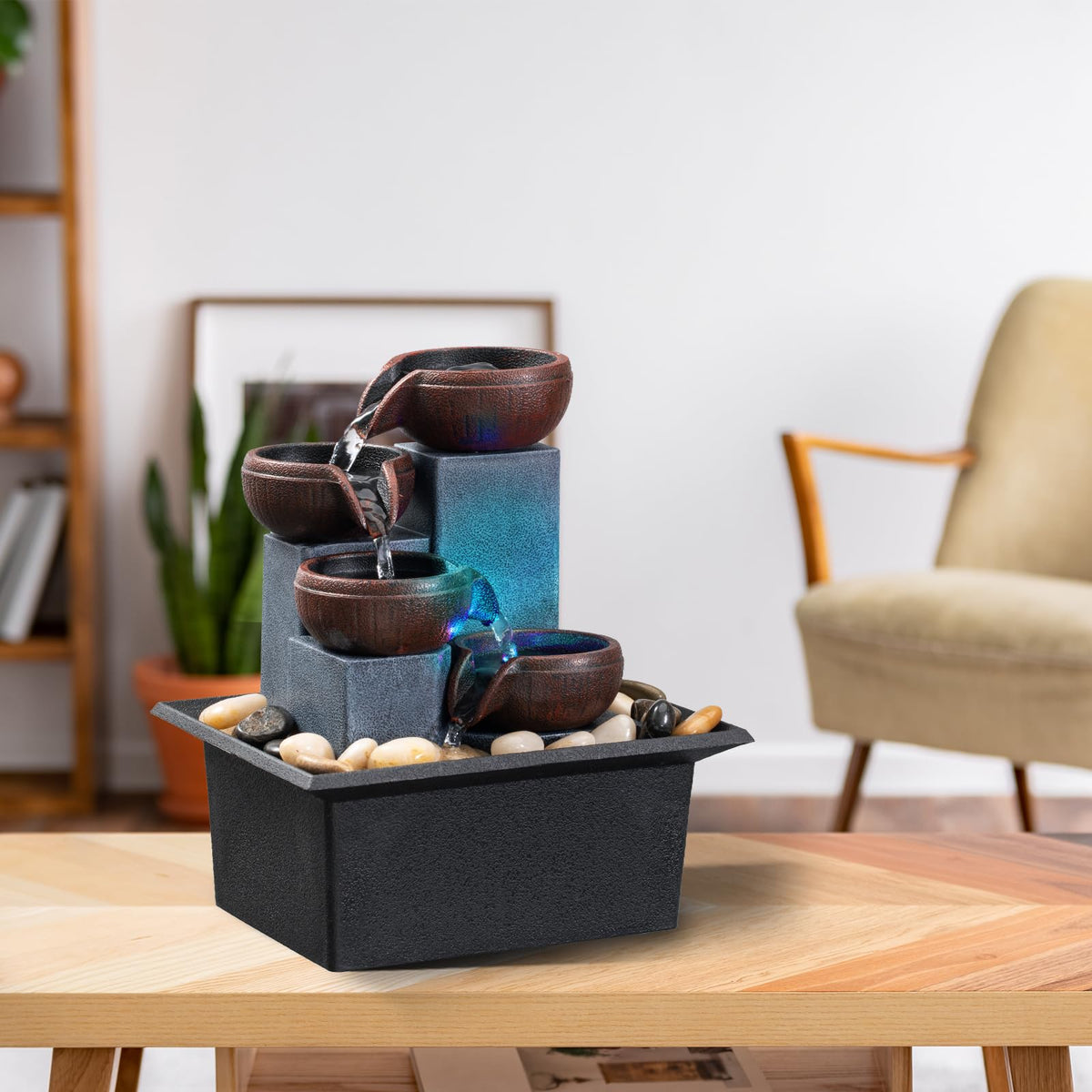 AMOOTEK self-contained fountain demonstrating no-piping setup on a tabletop.