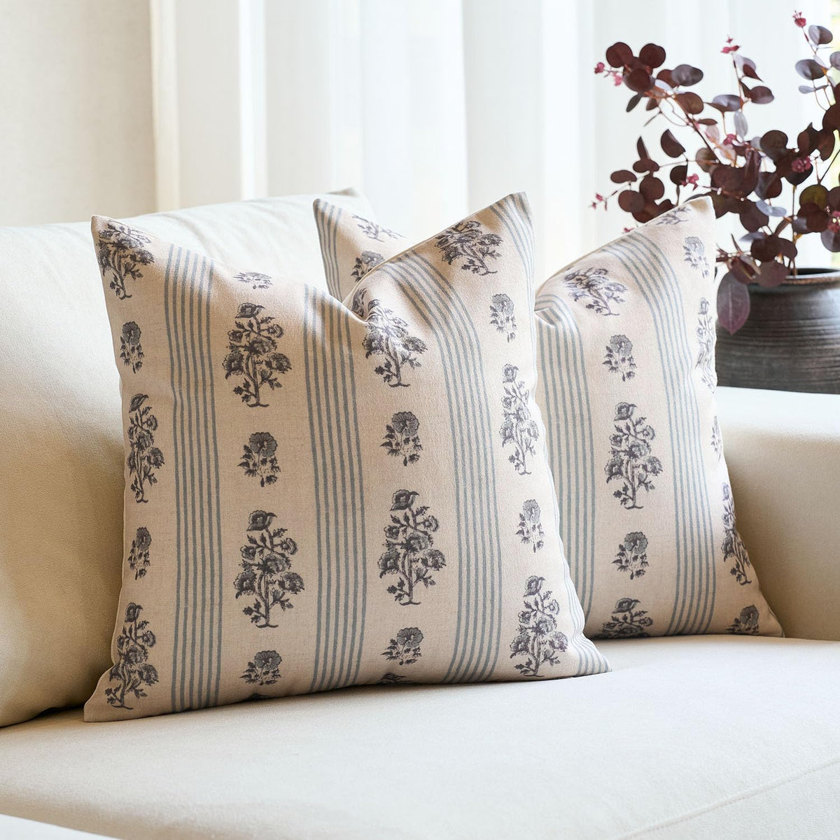 Amor Virisso floral front view pillow cover adds delicate decorative charm.
