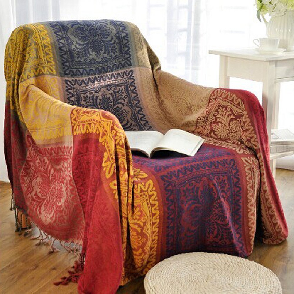 Amorus boho sofa cover in chenille with tassels protects and elevates your couch.