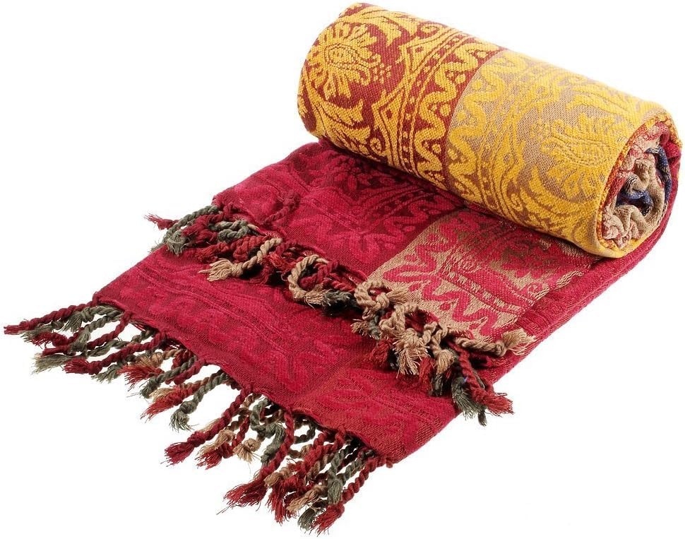 Amorus red color throw creates a focal accent on couches