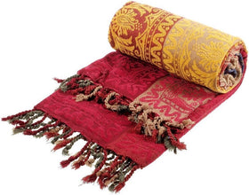 Amorus red color throw creates a focal accent on couches