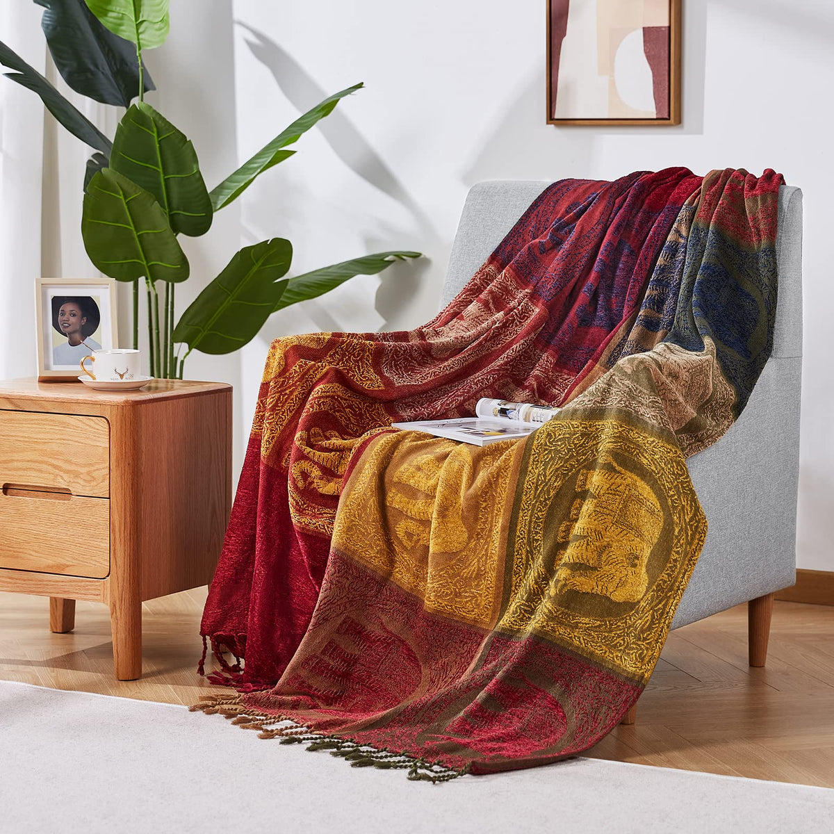 Amorus jacquard bohemian blanket shows red tribal pattern on bed