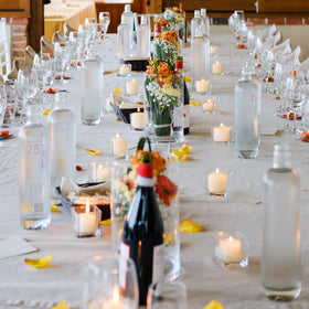 Amusaer ivory votive candle used at a wedding for elegant illumination.