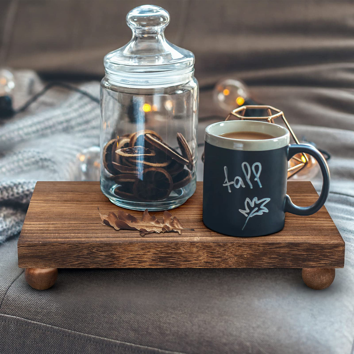 Amyhill multipurpose wood pedestal stand supports soaps, plants, and small decor.