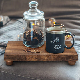 Amyhill multipurpose wood pedestal stand supports soaps, plants, and small decor.