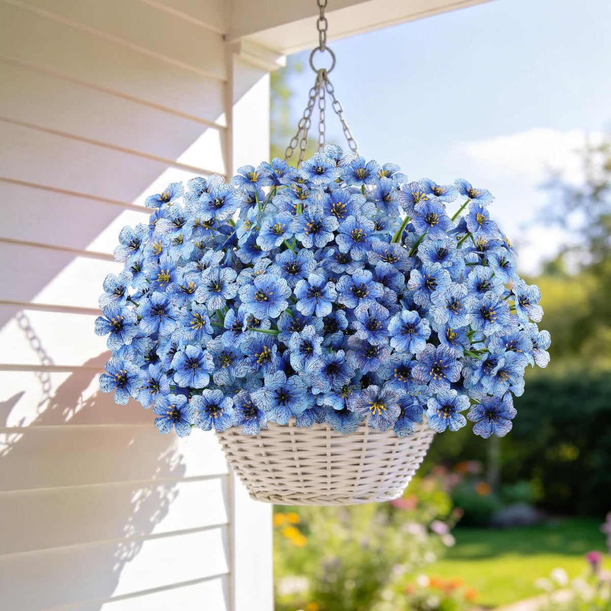 AmyHomie blue silk-like artificial flowers add vibrant color to planters.
