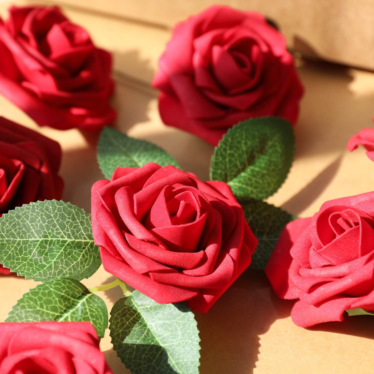 AmyHomie centerpieces featuring dark red roses for DIY decor