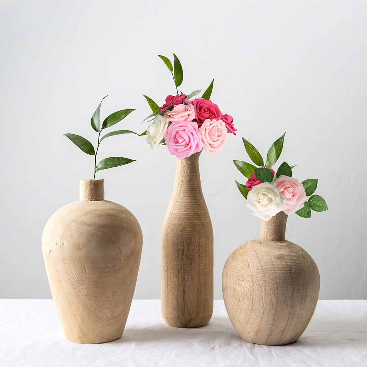 AmyHomie holiday roses add elegant festive touches to trees and centerpieces.