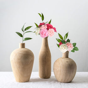 AmyHomie holiday roses add elegant festive touches to trees and centerpieces.