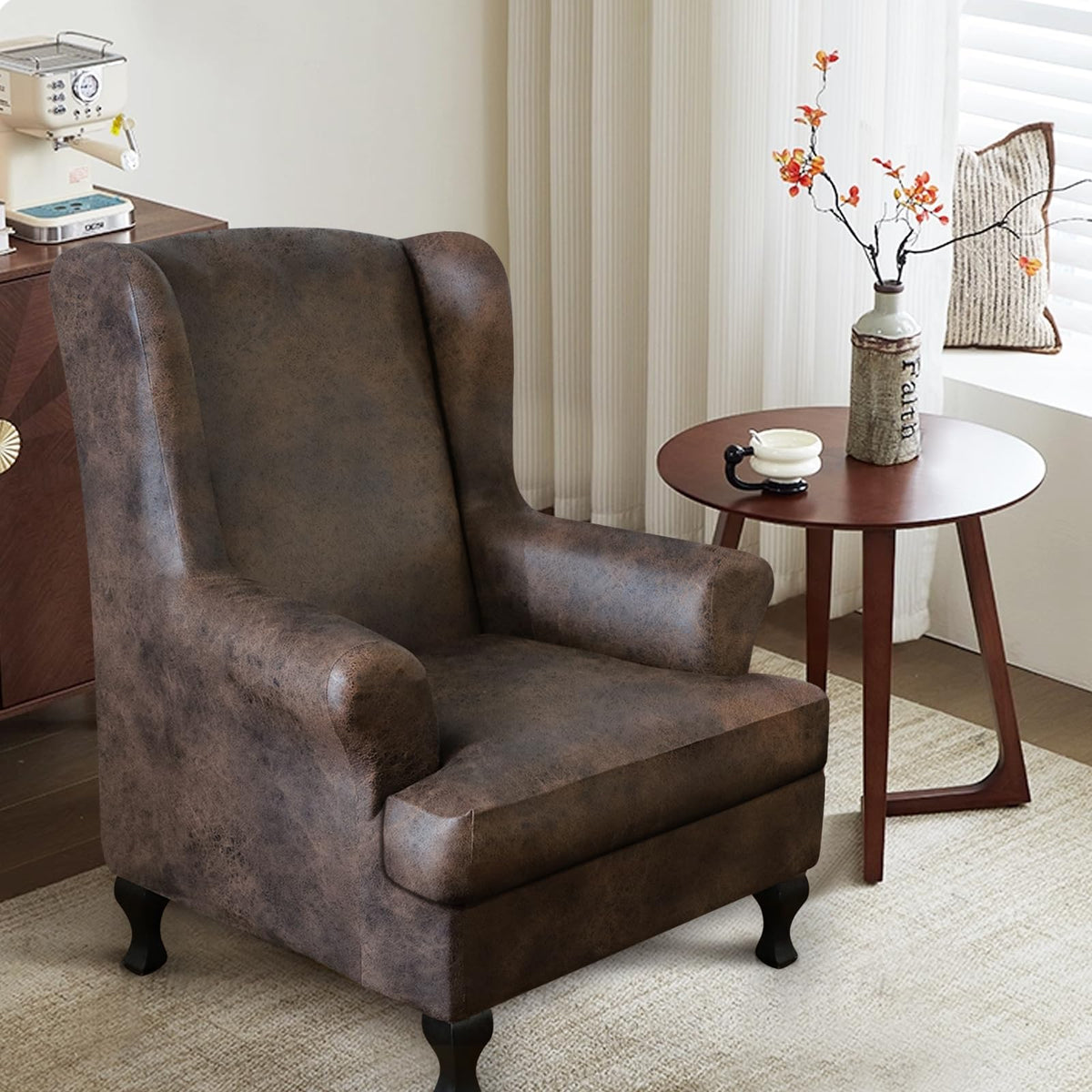 ANARACHON leather-look wingback cushion cover adds easy style and protection.