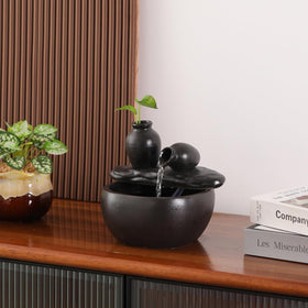 Andady ceramic tabletop fountain adds tranquil ambiance to home office setups.