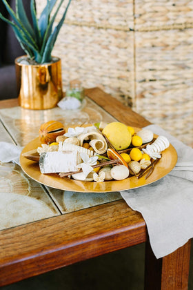 Andaluca table setup with wood bowl pour for a decorative scent