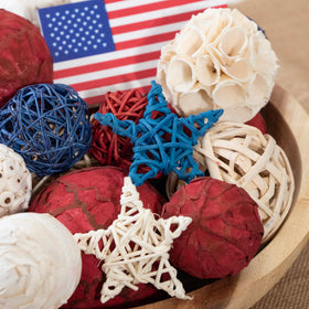 ANDALUCA decorative balls and stars mix for versatile patriotic arrangements.