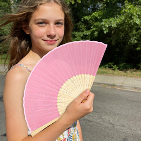 Aneco portable pink fans fit in a bag for on-the-go cooling.