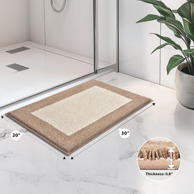 anllugs bathroom rug with non-slip backing stays securely in place.