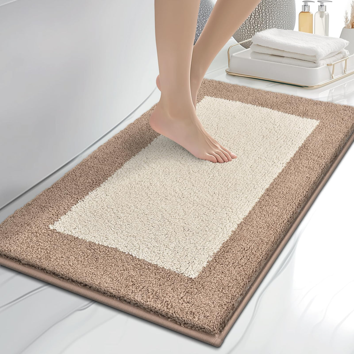 anllugs bathroom rug with soft absorbent surface cushions feet after showers.