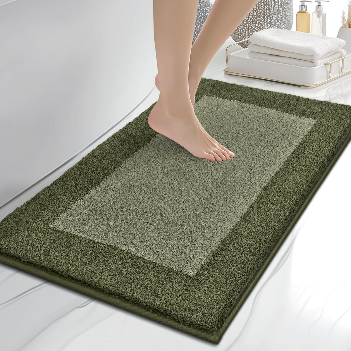 Anllugs ultra-soft olive-green bathroom rug offers plush comfort underfoot.
