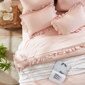 Anluoer pink bed-in-a-bag with coordinating sheets for easy styling.