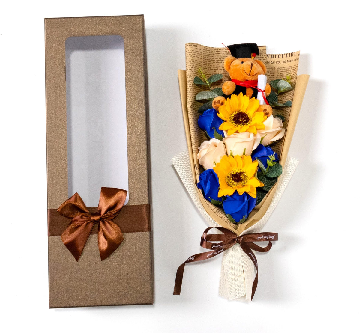 Ansuma plush teddy bear in a graduation cap adds playful charm.
