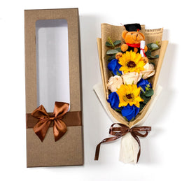 Ansuma plush teddy bear in a graduation cap adds playful charm.