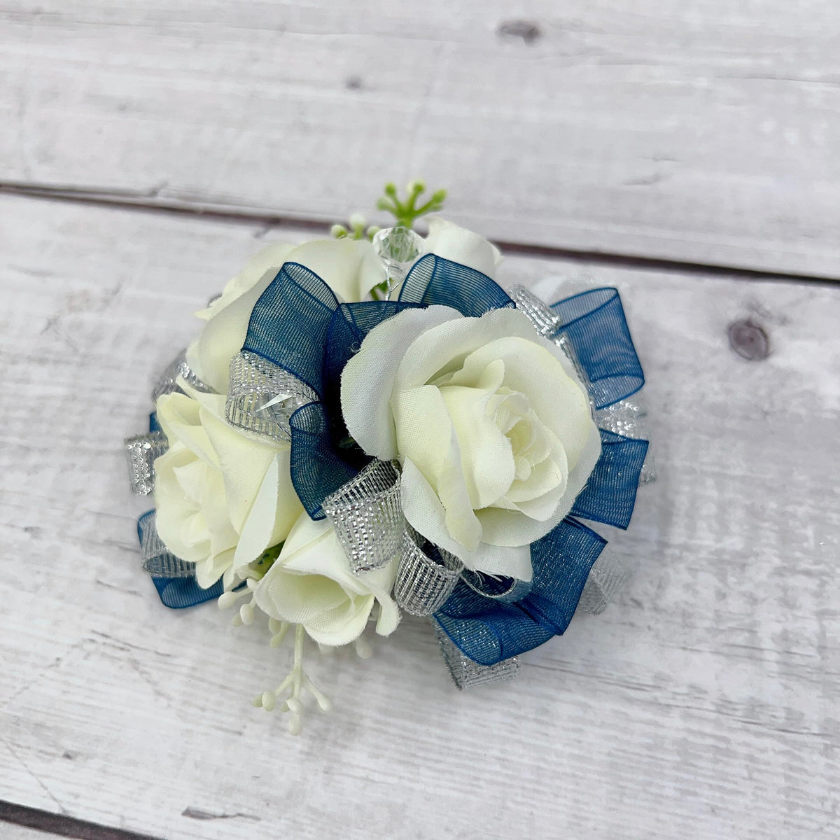 Ansuma handmade corsage details with lace bow and rhinestones.