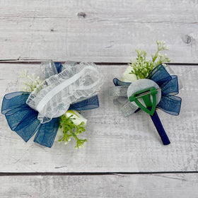 Ansuma ivory rose boutonniere for groom and groomsmen with matching design.