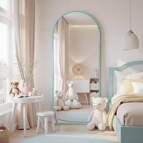 Antok arch mirror with blue aluminum frame shown in a modern bedroom for outfit checks.