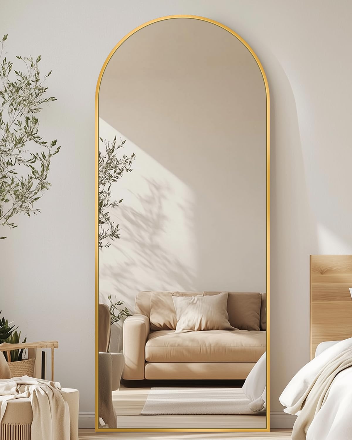 Antok arched full-length mirror with gold frame offers a crisp front view for outfits