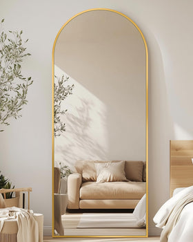 Antok arched full-length mirror with gold frame offers a crisp front view for outfits