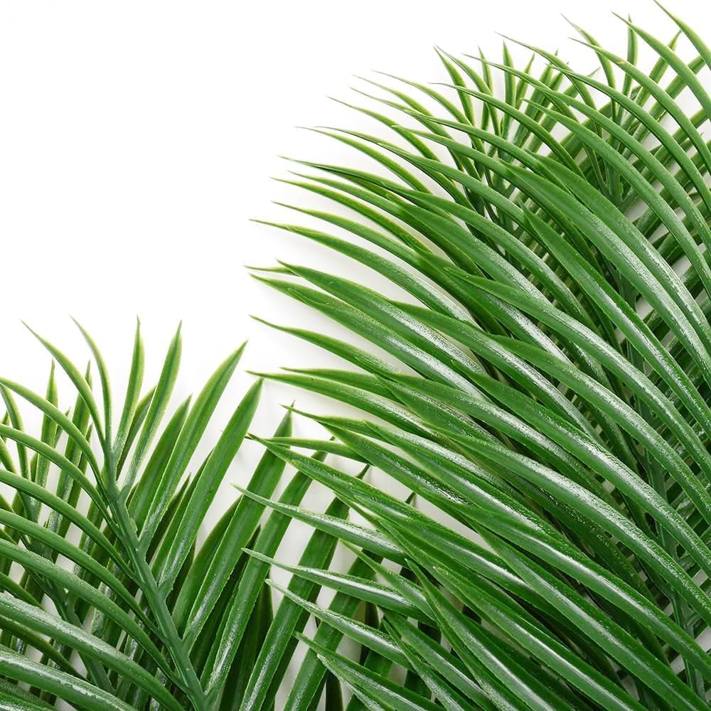 Antspirit palm leaves on dining table create elegant centerpieces.
