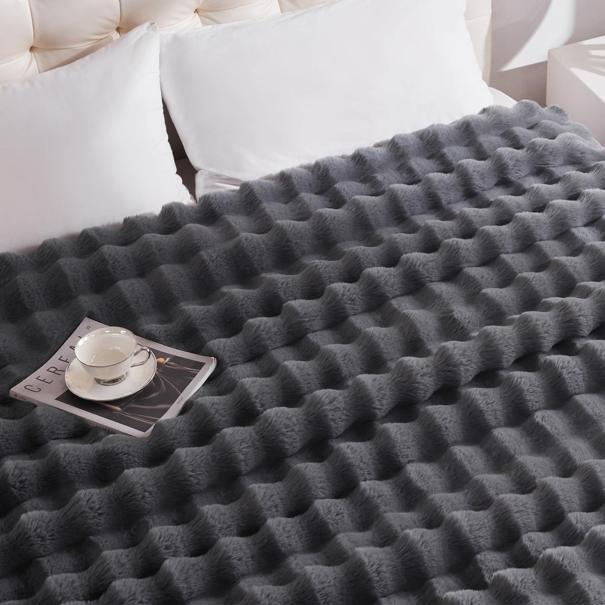 Anysay cozy blanket on a couch delivering soft warmth and comfort.