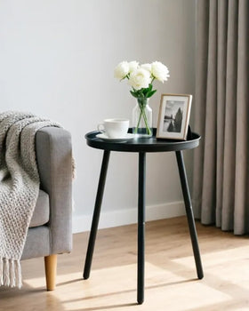 AOJEZOR side table with matte black finish and three legs, perfect as a bedside top.