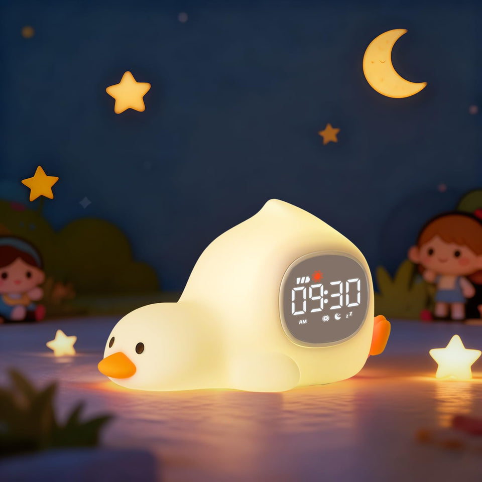 Aokpsrt Laying Duck Alarm Clock glows on a nightstand for gentle bedtime cues.