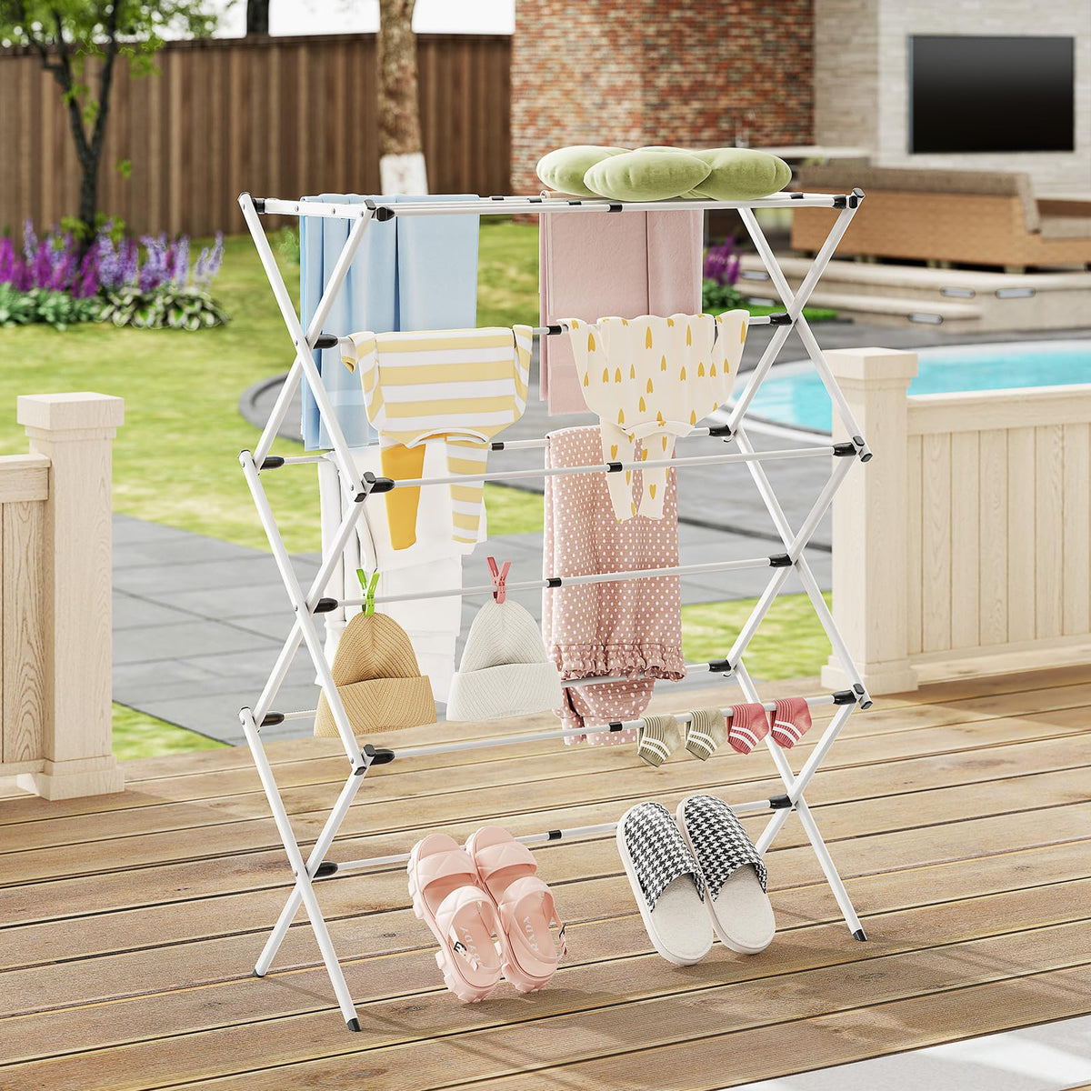 APEXCHASER drying rack indoors and outdoors for versatile laundry.