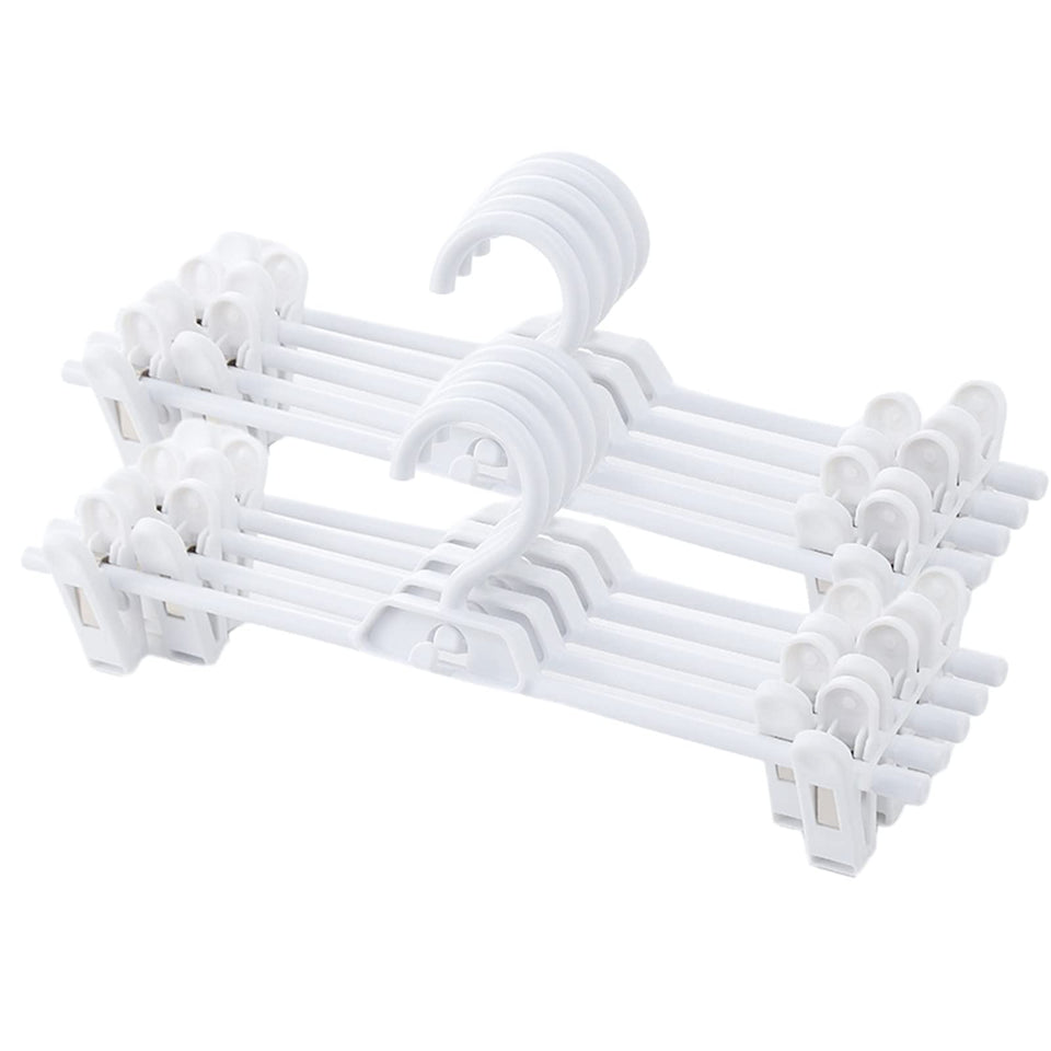 AQEMQV pants hangers with clips securing garments during air-drying.
