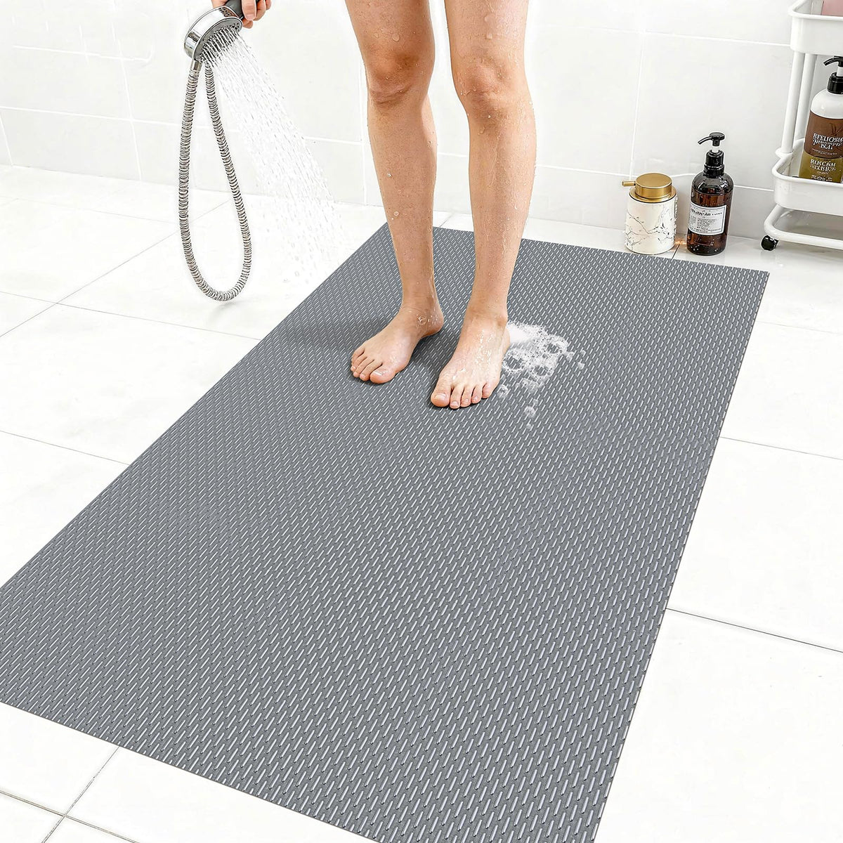 Aqzuxira extra-large gray shower mat with non-slip back for secure placement.