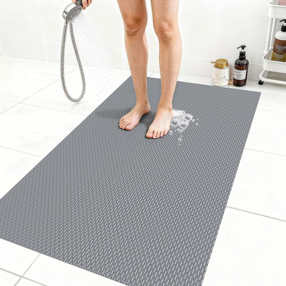 Aqzuxira extra-large gray shower mat with non-slip back for secure placement.