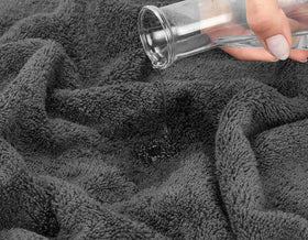 ARC HOME towels in charcoal grey showcase versatile, multi-use bathroom and gym settings