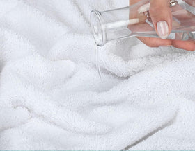 ARC HOME soft-tone towels in white hide small stains between washes.