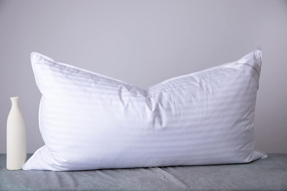 ArcticNorthDown king-size pillow with stripe white cover for all sleep positions.