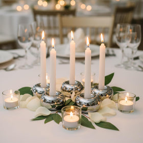 Ardax polished silver doughnut candlestick holder, pairs beautifully for symmetrical display.