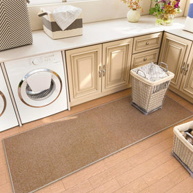 AREDO low-pile rug ideal for high-traffic entryways and under doors.