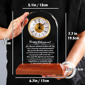 Arikyrist glass retirement clock with warm base lighting in a room