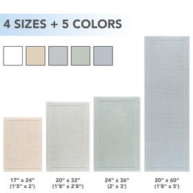 Arkwright 20x32 white bath rug fits standard shower and tub spaces.