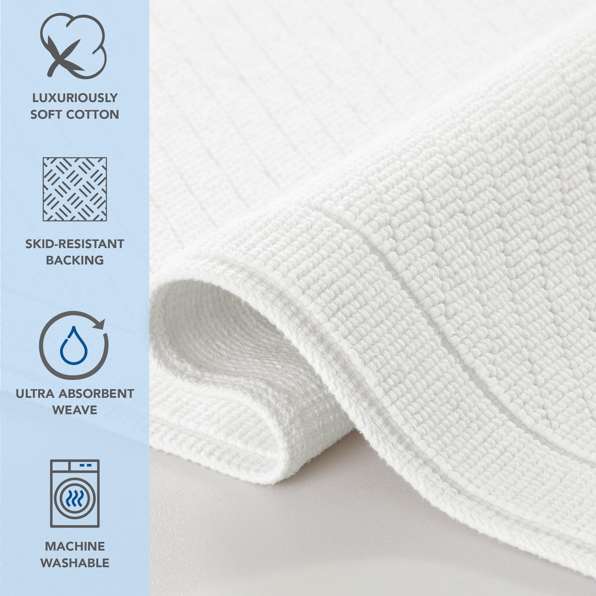 Close-up of Arkwright cotton rug showing plush pile and absorbency in bright white.