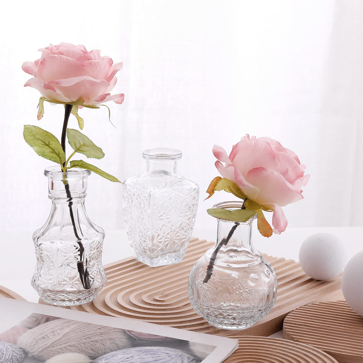 Arme rustic-wedding decor vases enhance guest tables with vintage flair.