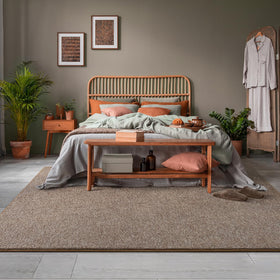 AROGAN living room rug with matte brown and white accents offers versatile style.